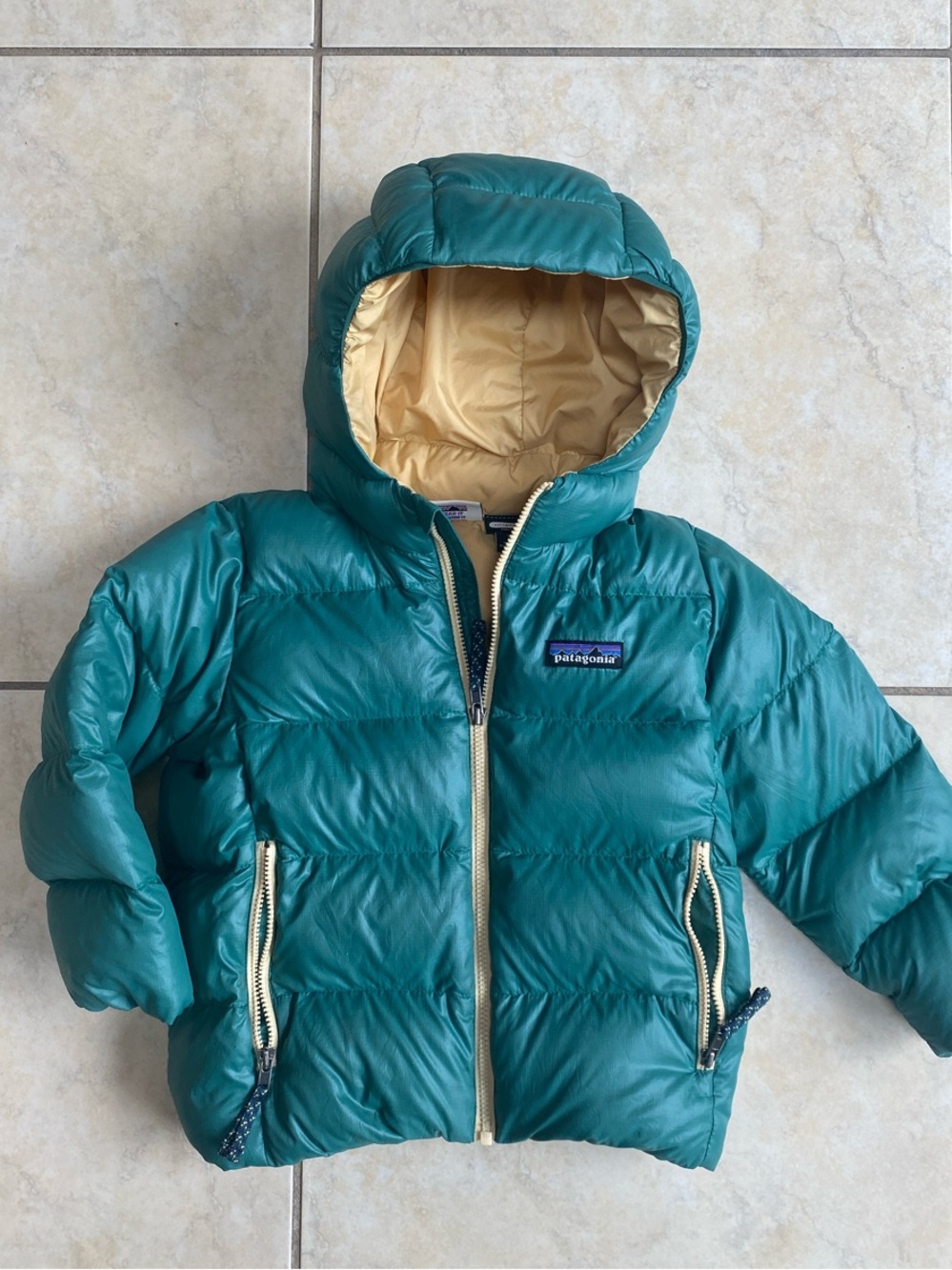 Patagonia 3T Hi Loft Down Green Jacket with yellow lining